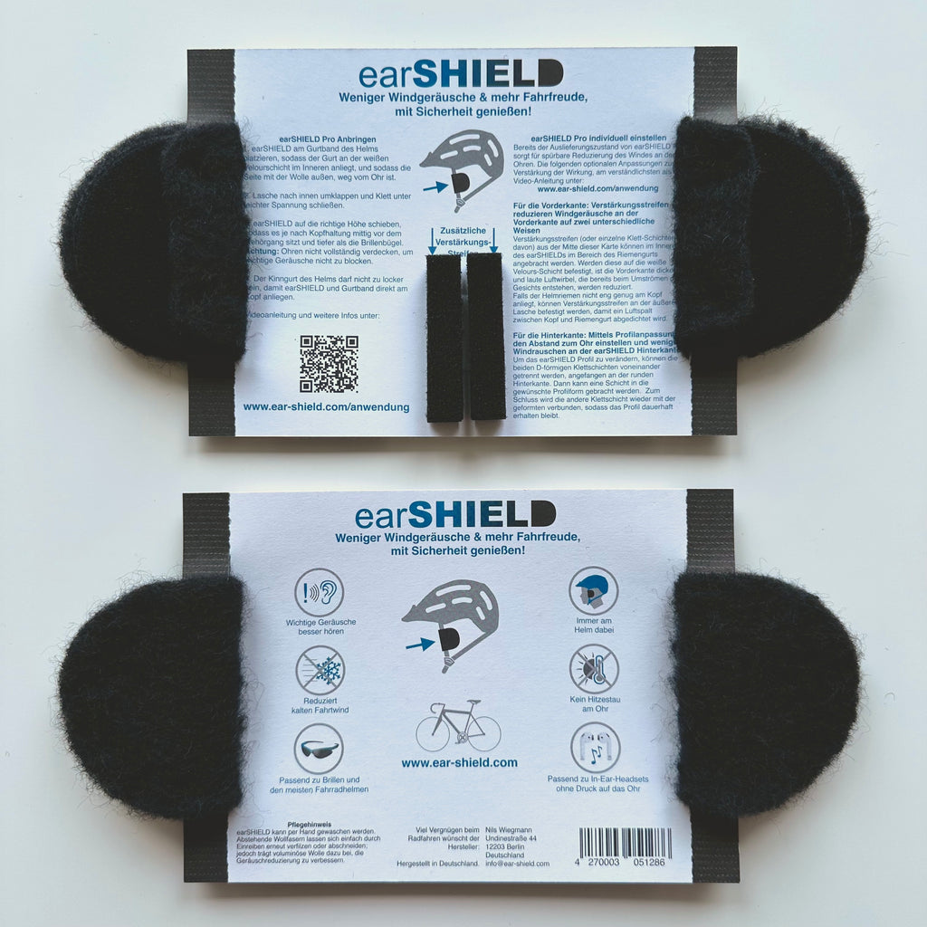 earSHIELD Pro Lieferumfang mit Produktkarte und Windschutz-Paar für Fahrradhelme
